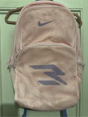 NWT Nike Women’s Pink Mesh Backpack with Purple Accents. 20”L x 14”W.